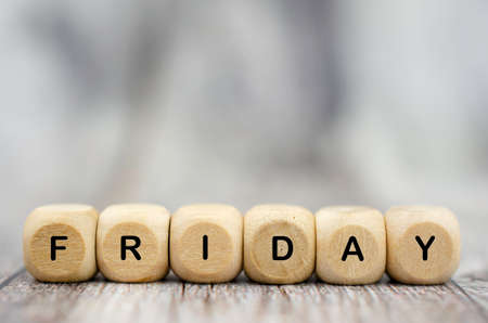 The word Friday on wooden cubes. Weekday conceptの写真素材