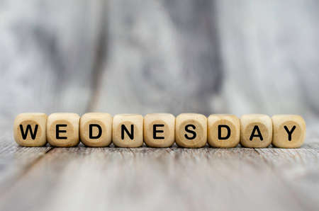 The word Wednesday on wooden cubes. Weekday conceptの写真素材
