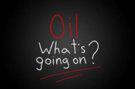 Negative chart on black chalkboard. Oil what going on inscriptionの写真素材