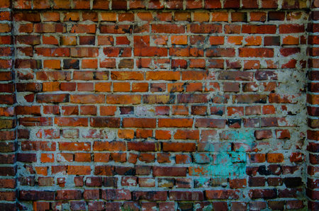 Old red brick wall background texture close up