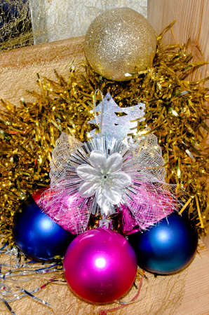 Christmas composition. Christmas red decorations, fir tree branches on red background. Flat lay, top view, copy spaceの写真素材