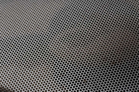 illustration of chrome metal grid with rounded honeycombsの写真素材