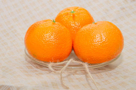 Ripe orange fresh mandarin, mandarin slices, isolated on white backgroundの写真素材