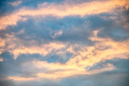 Beautiful cloudscape with sunray blue and redの写真素材