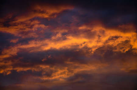 Beautiful cloudscape with sunray blue and redの写真素材