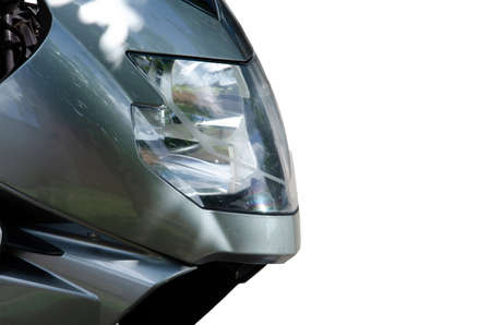 Close - up of a powerful motorcycle, isolated backgroundの写真素材