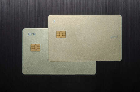 Business Card MockUp US Standard 3.5 x 2 inches . Empty Golden Rough Paper Cards Isolated on a Black Background.の写真素材