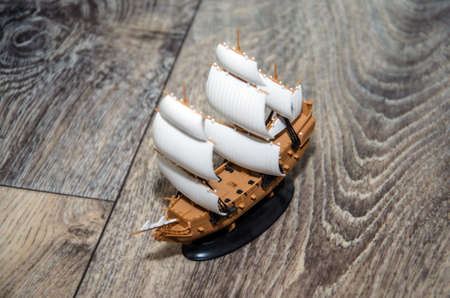 Collectible ship figurine in gold color. art. ship model.の写真素材