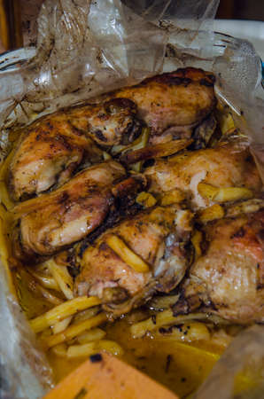 Fried chicken legs with french friesの写真素材