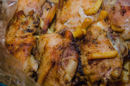 Fried chicken legs with french friesの写真素材