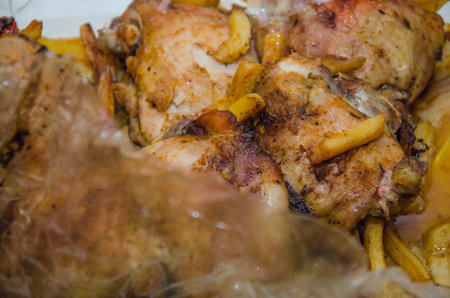 Fried chicken legs with french fries golden viewの写真素材