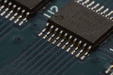Close-up printed circuit board with electronics components. Macro photography for electric...