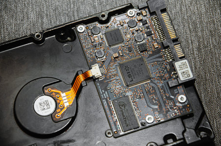 Close-up printed circuit board with electronics components. Macro photography for electric background, processor and SMD IC mounted components.の写真素材