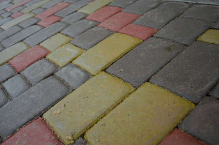 background of old cobblestone pavement close-up.の写真素材