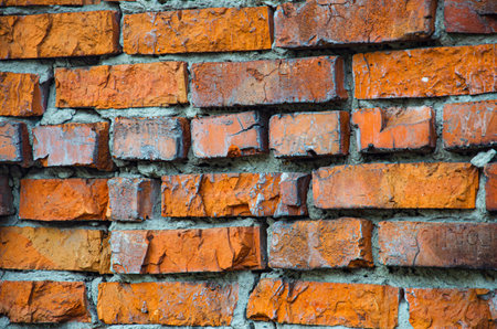 red brick wall texture grunge background with vignetted corners