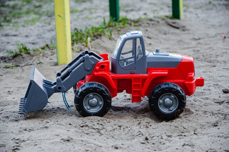 Children's plastic toy in the sandbox