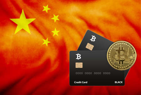 Illustration of two black credit cards and bitcoin coin on the background of the flag of Chinaの写真素材