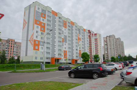 Building and Construction site of new homes. Facade of many story new houses under constructions.の写真素材