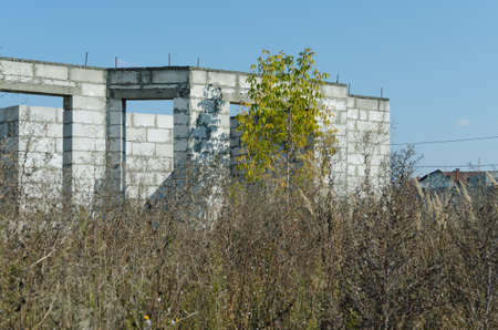 Building site of a house under construction made from white foam blocks. Building new frame of home.の写真素材