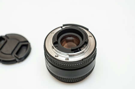 Black camera lens isolated in white backgroundの写真素材
