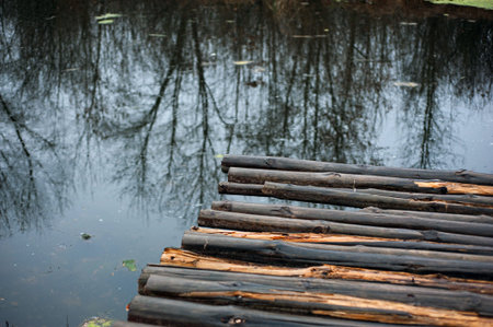 Empty wooden bridge or table top with the lake mountain and sky landscape. Wood floor with lake...