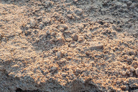 closeup of sand pattern of a beach in the summer textureの写真素材