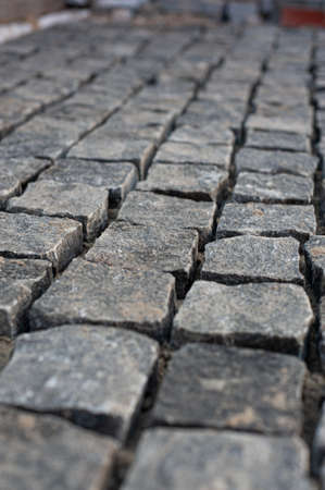coatings of paving stones, stone extending into the distance with a low depth of fieldの写真素材