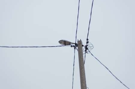 Electric Post and Street Lights on blue sky and cloud backgroundの写真素材