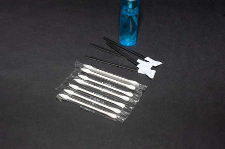Photographers stuff on black background with lens flash cards lenspen cardrider.の写真素材