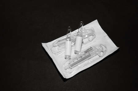 Medical disposable syringes with needles in the package.の写真素材