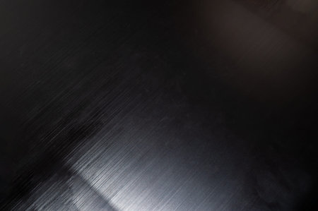 black polished aluminum background. stainless steel texture
