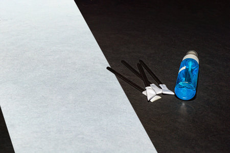 Professional cleaning products for SLR and mirrorless cameras and video cameras on a black...