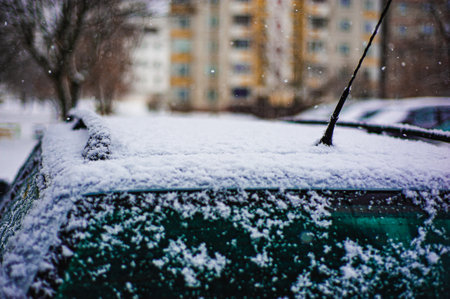 Car mirror in the snow. winter concept. Part of the carの写真素材