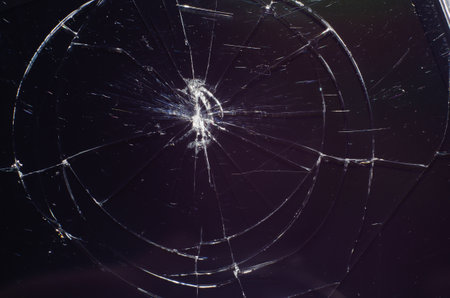 Texture broken glass with cracks. Abstract of cracked screen Smartphone from shockの写真素材