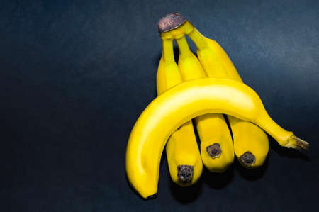 Bunch of banana isolated on black background.の写真素材
