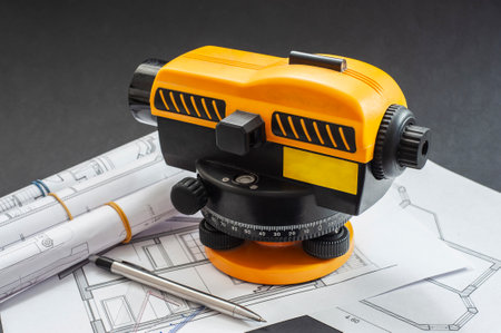 Photographer of a level at a construction site. construction in the background.の写真素材
