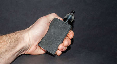 big electronic cigarettes isolated on black backgroundの写真素材