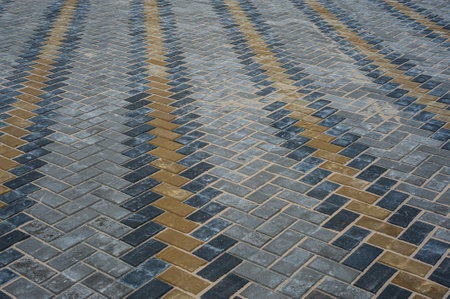Paving slabs of different colors and shapes.Texture of different colored patterned paving slabs .の写真素材