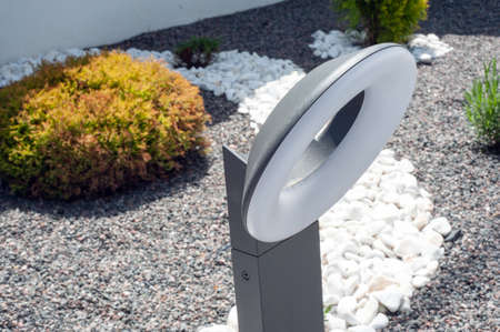 Outdoor lamp on yard lawn for garden lighting in summer park lightの写真素材