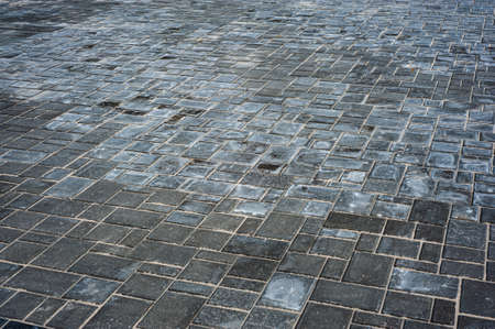 Brick path or sidewalk with perspective going into the distance with soft sunlight reflecting of the bricks.の写真素材