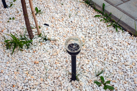 Outdoor lamp on yard lawn for garden lighting in summer park lightの写真素材