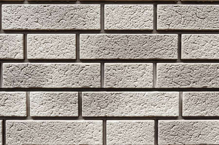 Wall texture and gray block pattern are suitable for a simple design background.の写真素材