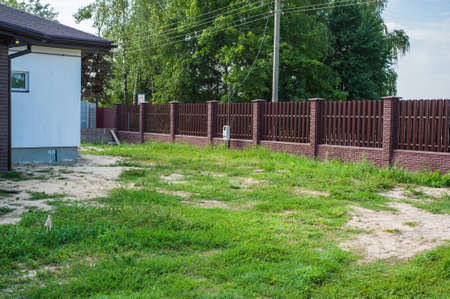 Modern privacy fence as garden or property boundary.の写真素材