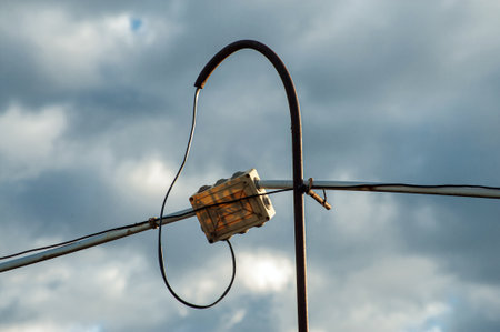 Electric lines overhead, power lines against bles sky.の写真素材
