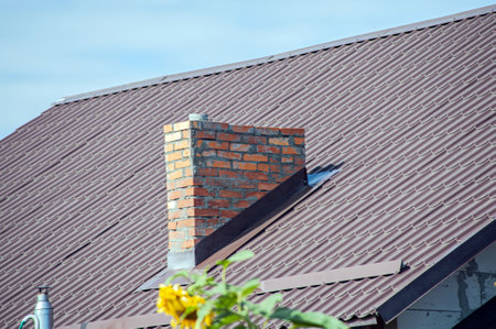 Close up chimney on the roof houseの写真素材