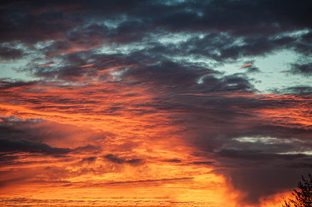 Sunset sunrise with clouds, light rays and other atmosphericの写真素材