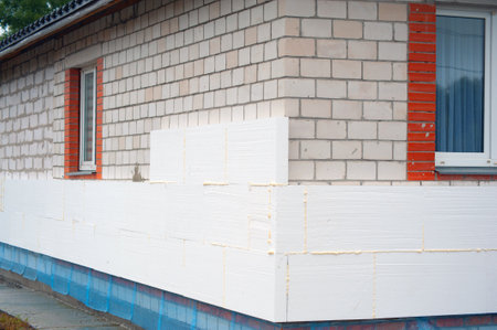 Building site of a house under construction made from white foam blocks. Building new frame of home.の写真素材