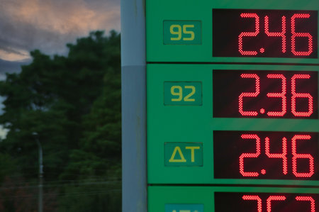 Bargain gas prices are displayed at a gas station.の写真素材