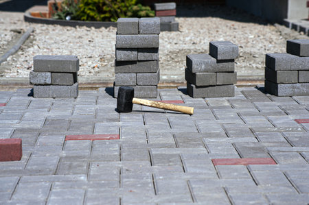 Paving slabs of different colors and shapes.Texture of different colored patterned paving slabs .の写真素材