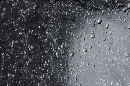 Macro photo of a drop on the glassの写真素材